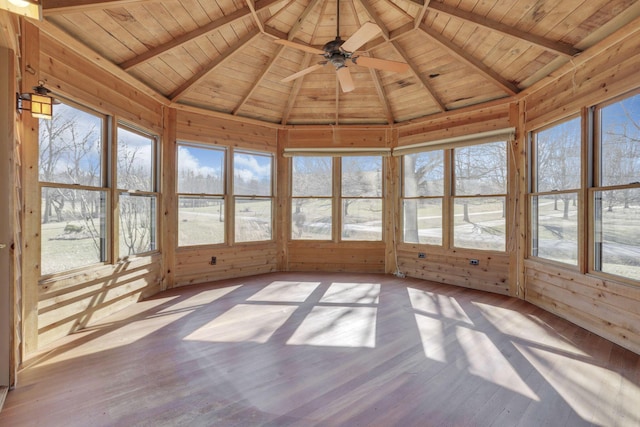 unfurnished sunroom featuring wooden ceiling, lofted ceiling with beams, and ceiling fan