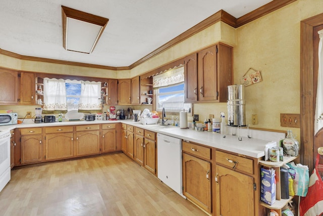 kitchen with white appliances, light wood finished floors, open shelves, a sink, and brown cabinets