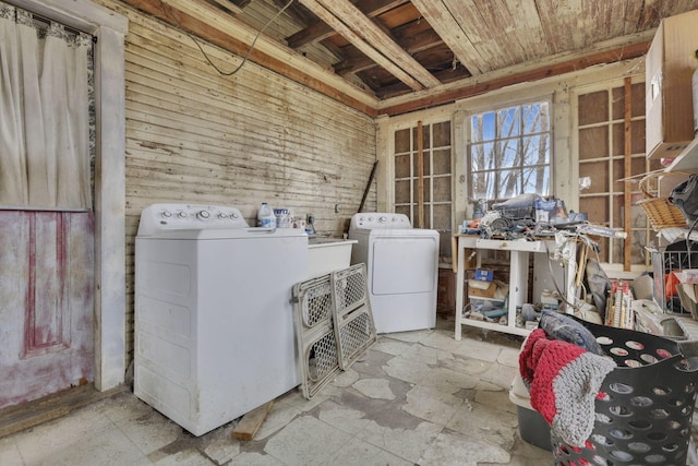 laundry area featuring independent washer and dryer and laundry area