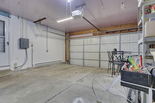 garage with electric panel, baseboard heating, and a garage door opener