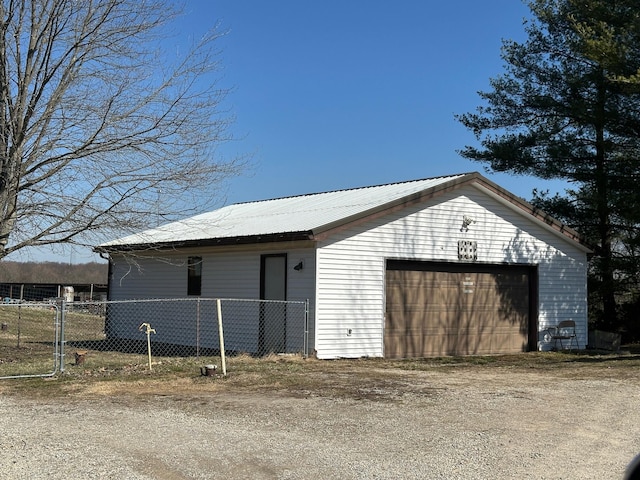 garage with fence