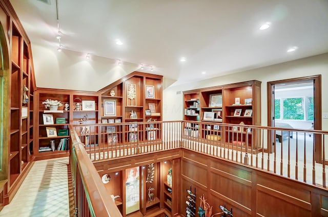 hallway featuring recessed lighting and track lighting