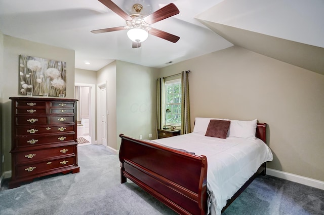 bedroom featuring vaulted ceiling, carpet, baseboards, and ceiling fan