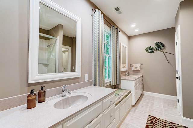 full bathroom featuring visible vents, two vanities, a sink, recessed lighting, and baseboards