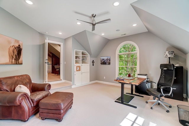 office area with visible vents, built in features, carpet floors, baseboards, and vaulted ceiling