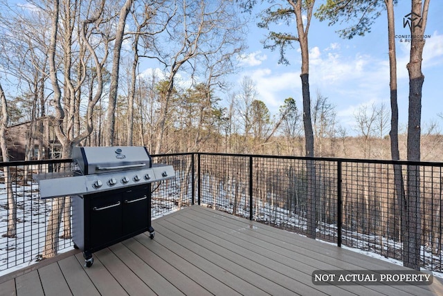 wooden deck featuring grilling area