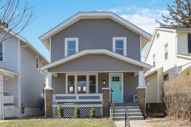 traditional style home with covered porch