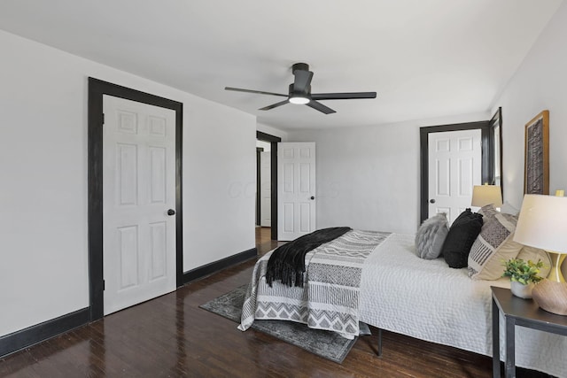 bedroom with wood finished floors, baseboards, and ceiling fan