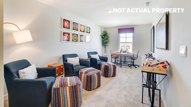 living area featuring visible vents and light carpet