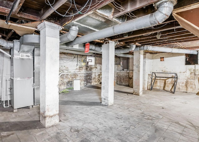 unfinished basement with heating unit