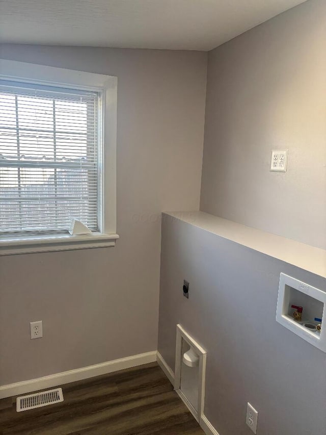 laundry area featuring visible vents, baseboards, hookup for an electric dryer, hookup for a washing machine, and laundry area