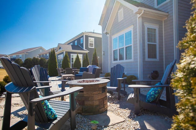 view of patio featuring a fire pit