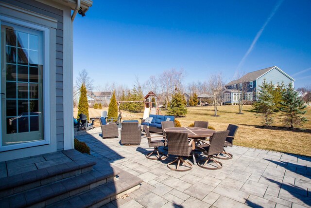 view of patio with an outdoor living space and outdoor dining area