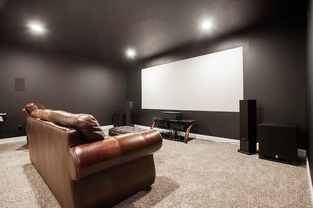 cinema room with recessed lighting, baseboards, and carpet floors