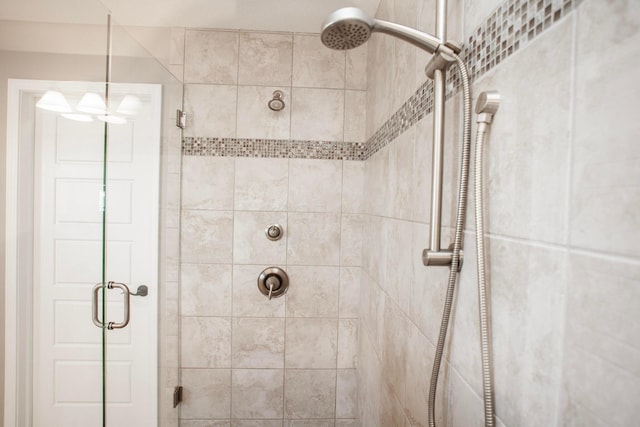 bathroom with a shower stall