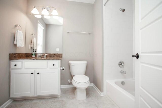 bathroom featuring vanity, baseboards, shower / bath combination, tile patterned floors, and toilet