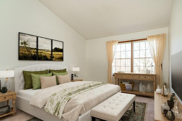 bedroom featuring vaulted ceiling and carpet floors