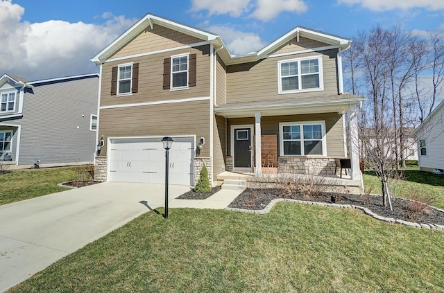 craftsman-style house featuring stone siding, driveway, a front lawn, and an attached garage