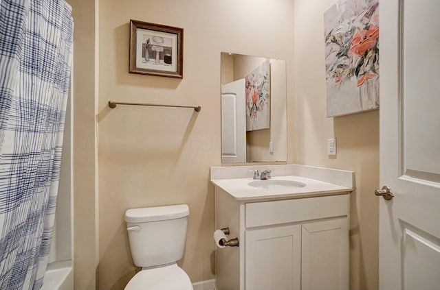 full bath with vanity, toilet, and shower / bath combo