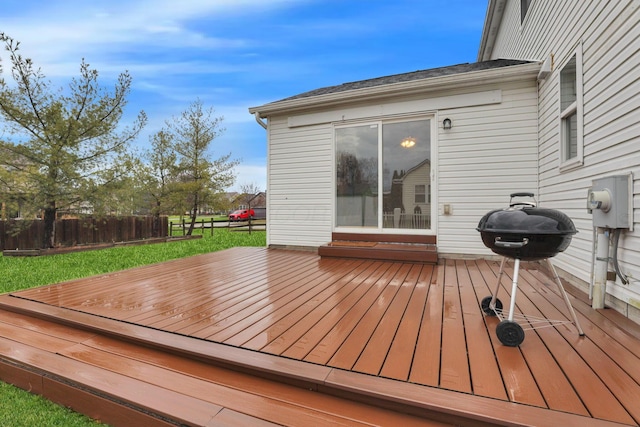 wooden deck featuring fence