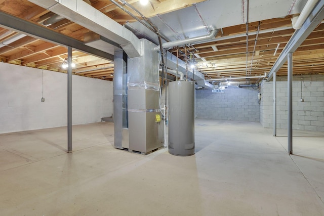 unfinished basement featuring water heater and heating unit