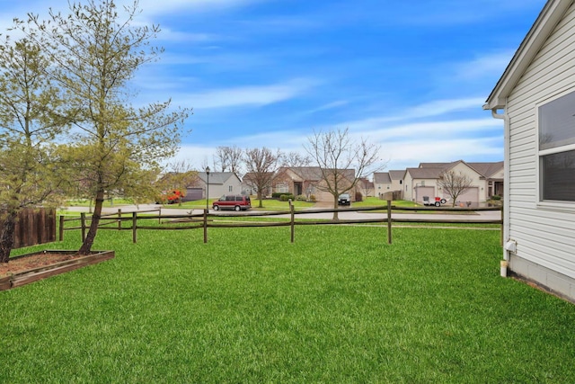 view of yard with a residential view