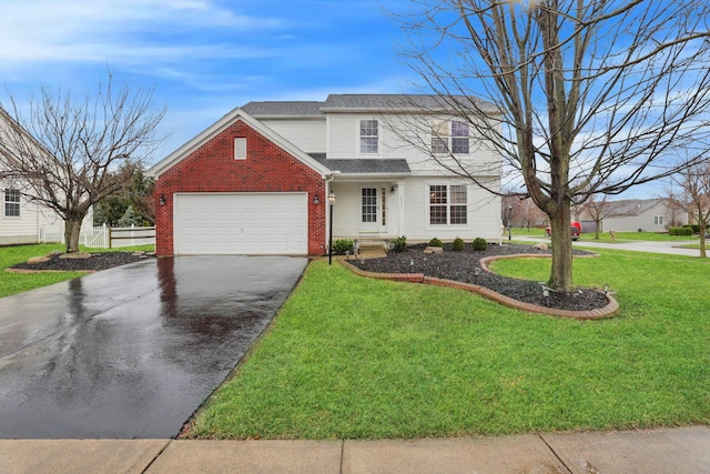 traditional-style house with a front lawn, brick siding, a garage, and aphalt driveway