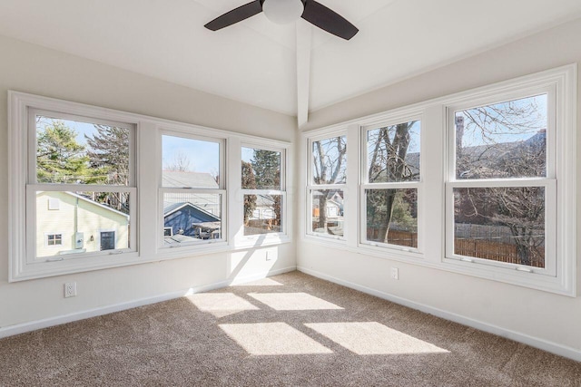 unfurnished sunroom featuring vaulted ceiling and ceiling fan