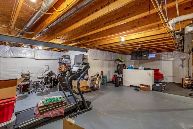 unfinished basement with brick wall