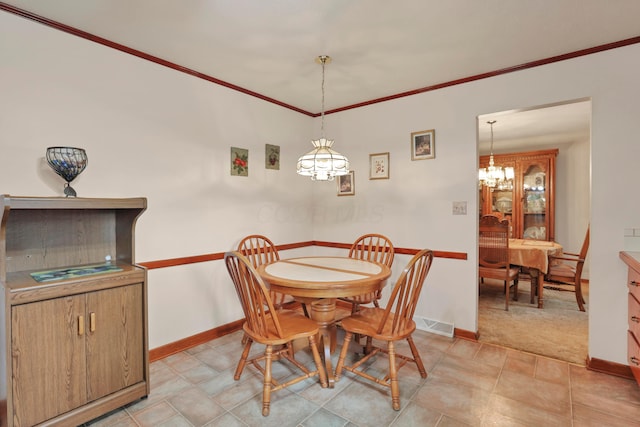 2639 Halleck Dr, Columbus, OH 43209 - dining room with a chandelier, baseboards, and crown molding