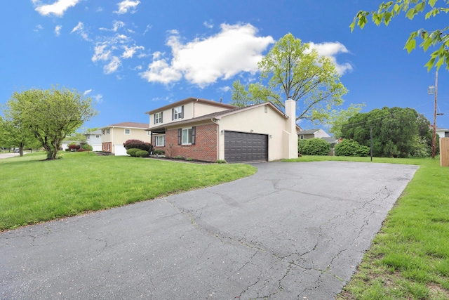 2639 Halleck Dr, Columbus, OH 43209 - view of side of home featuring driveway, a garage, a yard, and a chimney