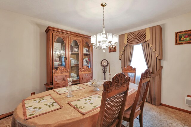 2639 Halleck Dr, Columbus, OH 43209 - dining area with a chandelier, light colored carpet, and baseboards
