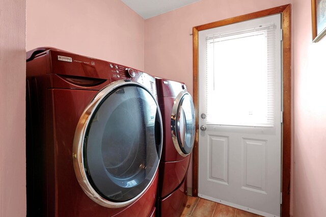 2639 Halleck Dr, Columbus, OH 43209 - clothes washing area with washer and dryer and light tile patterned floors
