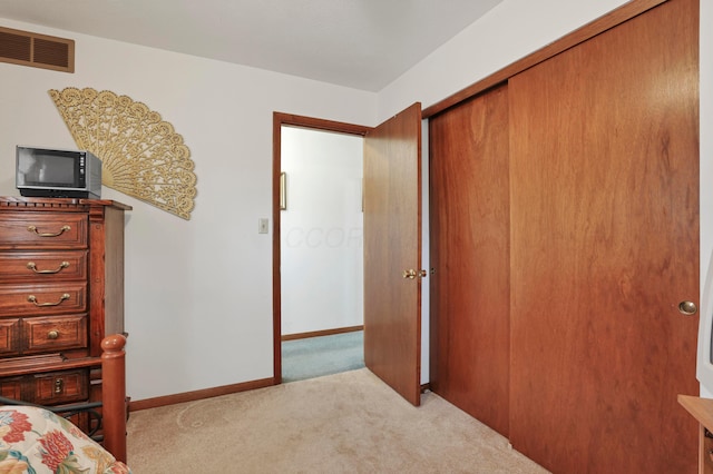 2639 Halleck Dr, Columbus, OH 43209 - bedroom with carpet, a closet, and baseboards