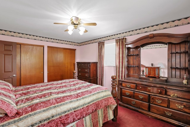 2639 Halleck Dr, Columbus, OH 43209 - bedroom with carpet, two closets, and a ceiling fan