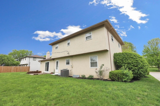 2639 Halleck Dr, Columbus, OH 43209 - back of house featuring stucco siding and central AC