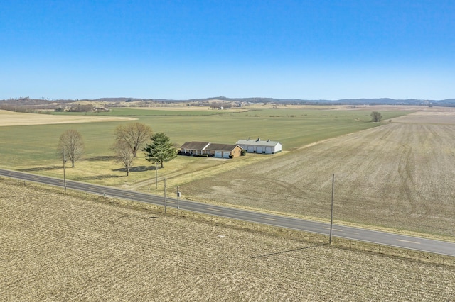 birds eye view of property featuring a rural view