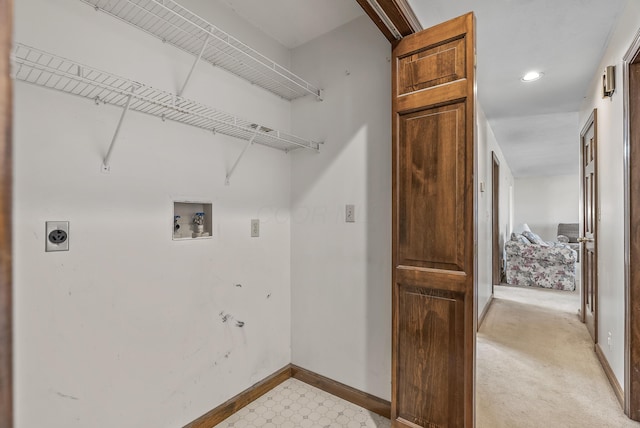 laundry area with hookup for a washing machine, laundry area, baseboards, and electric dryer hookup