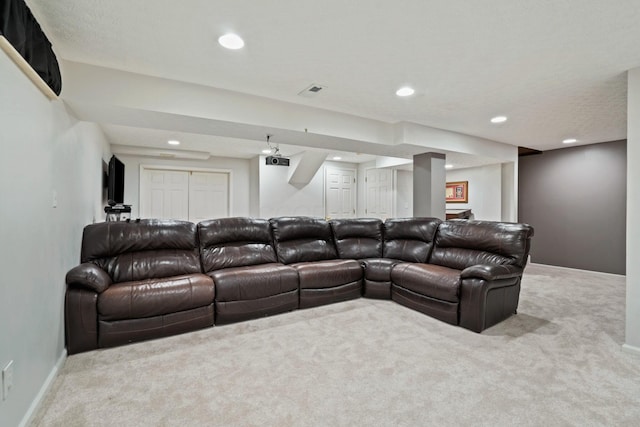 living room with carpet flooring, recessed lighting, visible vents, and baseboards