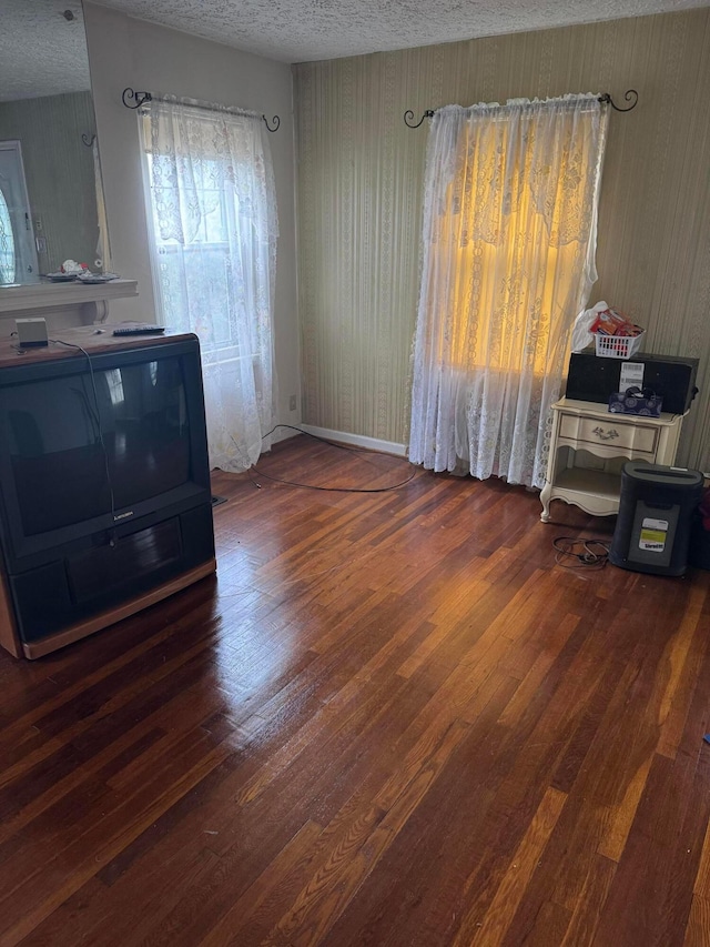1767 Forest St, Columbus, OH 43206 - dining area featuring a textured ceiling and hardwood / wood-style flooring