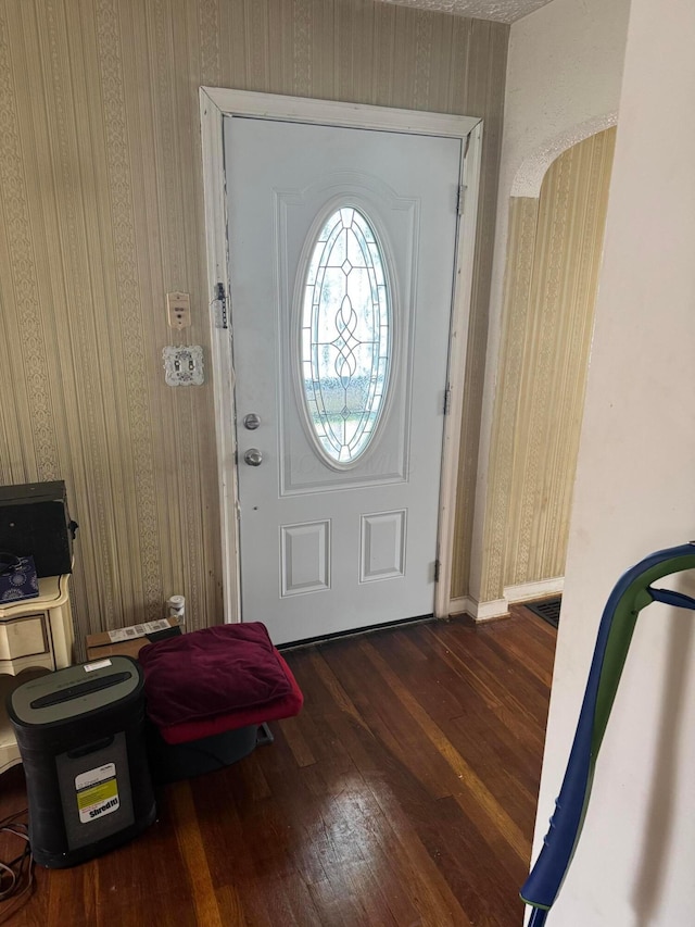 1767 Forest St, Columbus, OH 43206 - foyer entrance with wallpapered walls, hardwood / wood-style flooring, and baseboards
