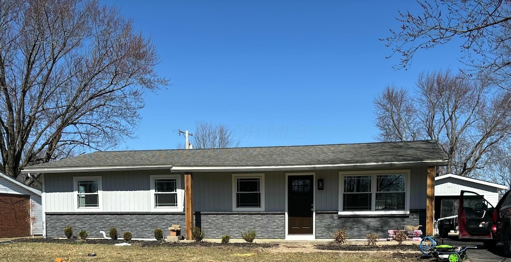 view of front of property with stone siding