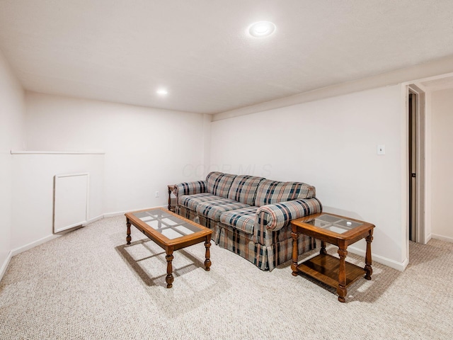 carpeted living room featuring recessed lighting and baseboards