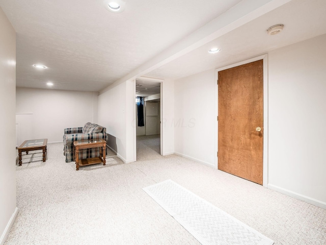 interior space with carpet flooring, recessed lighting, and baseboards