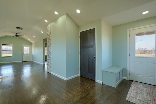 interior space featuring baseboards, lofted ceiling, recessed lighting, dark wood-style flooring, and ceiling fan