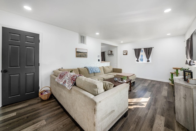 living area with visible vents, recessed lighting, dark wood-style flooring, and baseboards