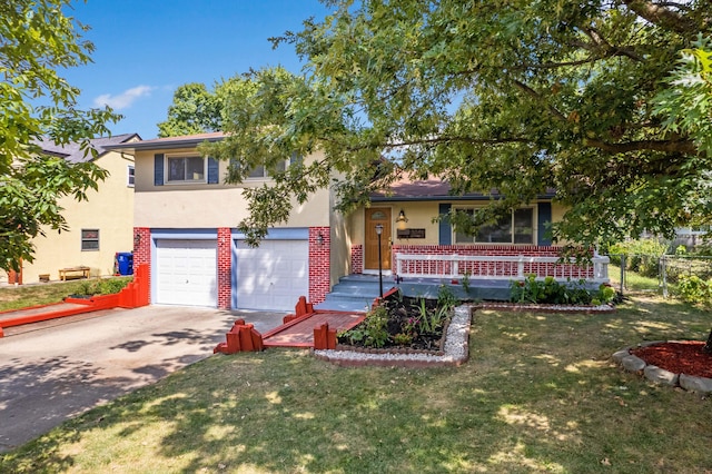 split level home featuring fence, driveway, stucco siding, a garage, and brick siding