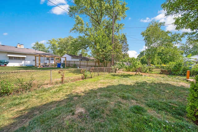 view of yard featuring fence