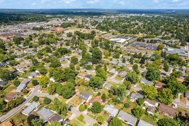 birds eye view of property with a residential view