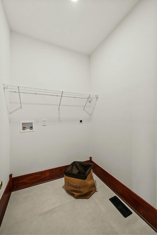 laundry room featuring baseboards, visible vents, laundry area, electric dryer hookup, and washer hookup